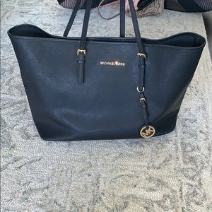 Michael Kors large black tote bag.